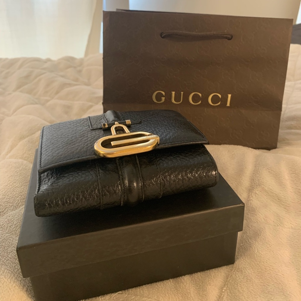 Gucci black and gold wallet